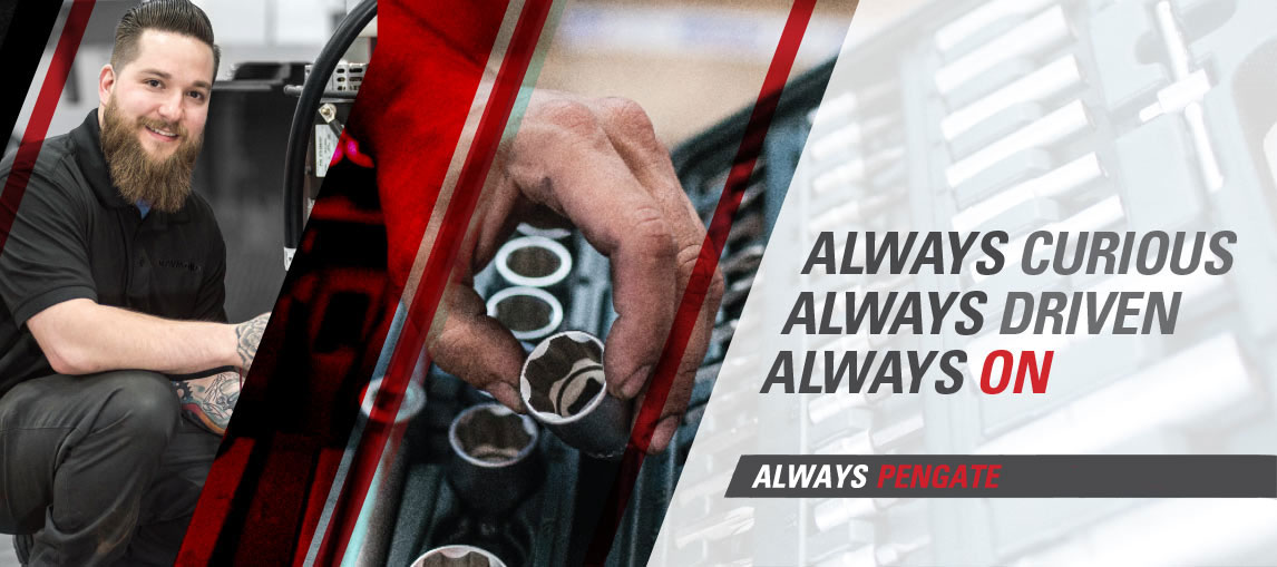 A Pengate technician services a Raymond lift truck in a customer's warehouse.